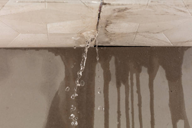 Professional Flood Damage Cleanup technician working in Carnegie, PA